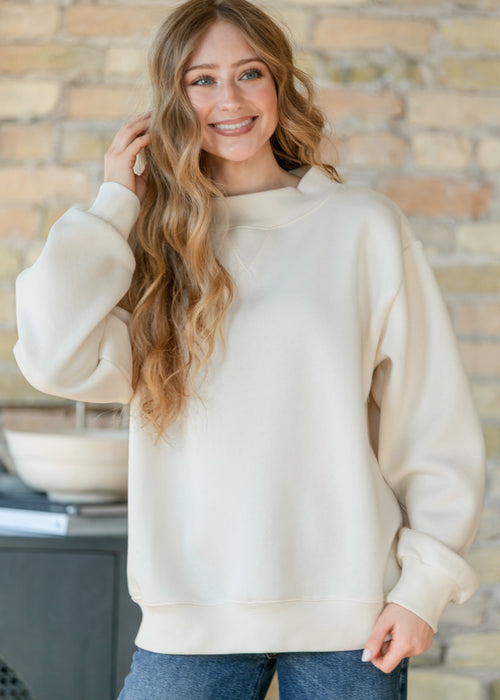 Things Between® Nelly Mock Neck Cream Sweatshirt